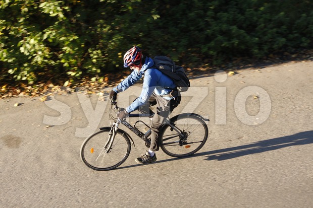Cyclist Driving on the Road Stock Photo