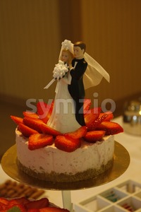 Wedding Cake with Couple Stock Photo