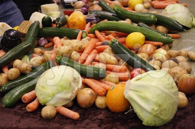 Carrots, cabbages, cucumbers, potatoes and citrus on the table